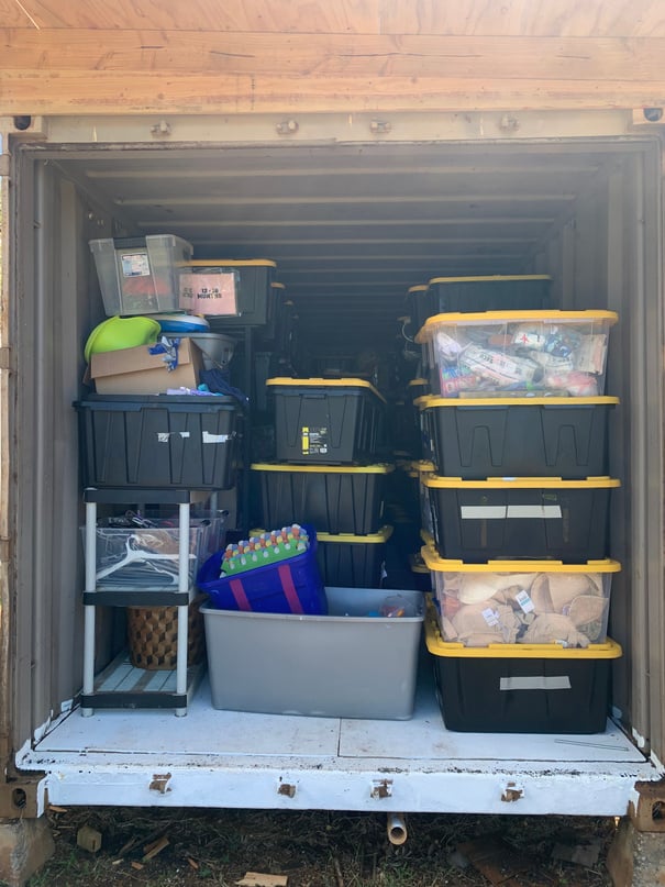 Organized storage tubs arranged inside a mobile service vehicle